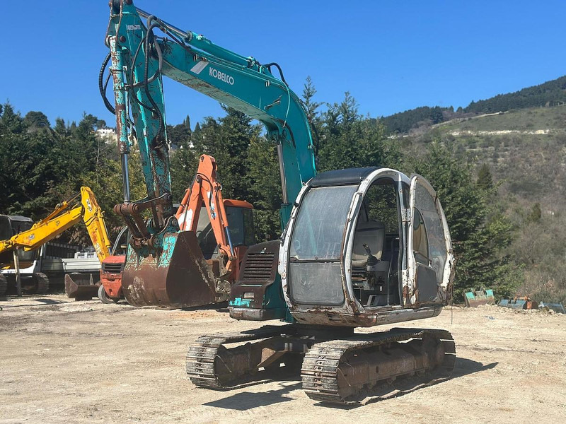 Kobelco SK60 - Εκσκαφέας: φωτογραφία 1 Kobelco SK60 - Εκσκαφέας: φωτογραφία 1