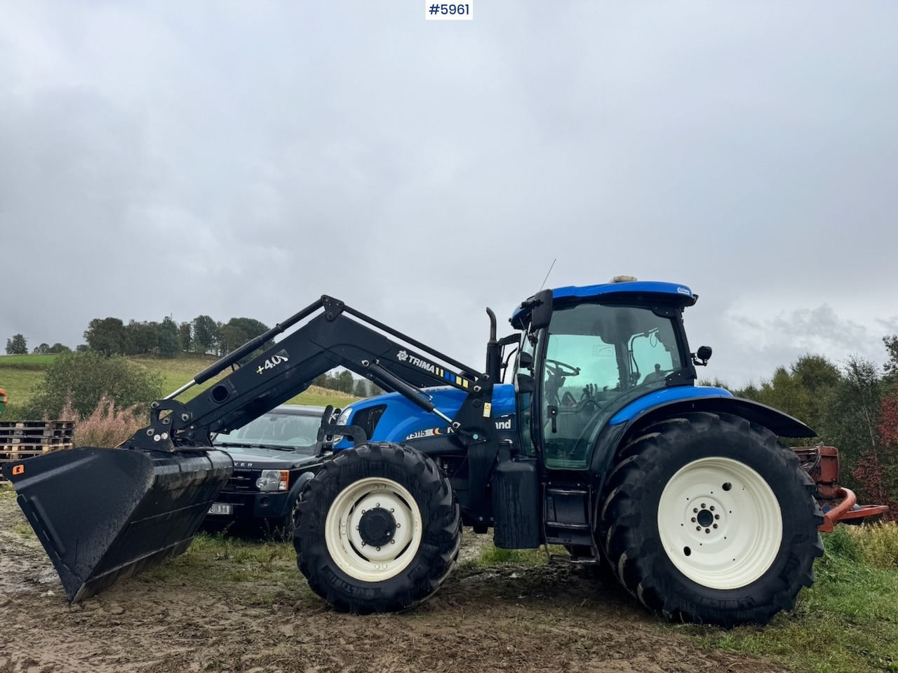 2004 New Holland TS115A with front loader - Τρακτέρ: φωτογραφία 1 2004 New Holland TS115A with front loader - Τρακτέρ: φωτογραφία 1