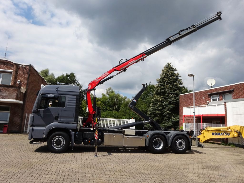 MAN 26.500 Abroller + Fassi F125A Kran 6x2-4 Allrad - Φορτηγό με γερανό, Φορτηγό φόρτωσης γάντζου: φωτογραφία 1 MAN 26.500 Abroller + Fassi F125A Kran 6x2-4 Allrad - Φορτηγό με γερανό, Φορτηγό φόρτωσης γάντζου: φωτογραφία 1