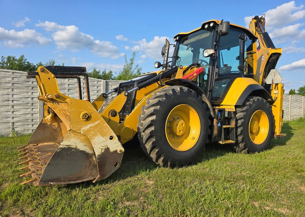 Caterpillar - Φορτωτής εκσκαφέας: φωτογραφία 1 Caterpillar - Φορτωτής εκσκαφέας: φωτογραφία 1