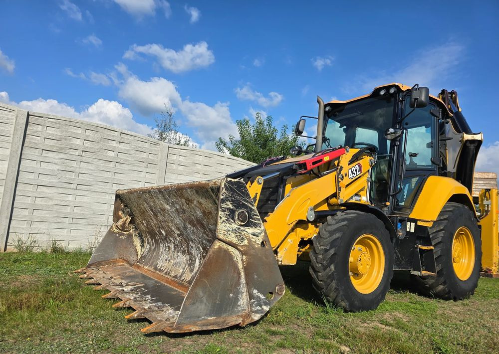 Caterpillar - Φορτωτής εκσκαφέας: φωτογραφία 1 Caterpillar - Φορτωτής εκσκαφέας: φωτογραφία 1