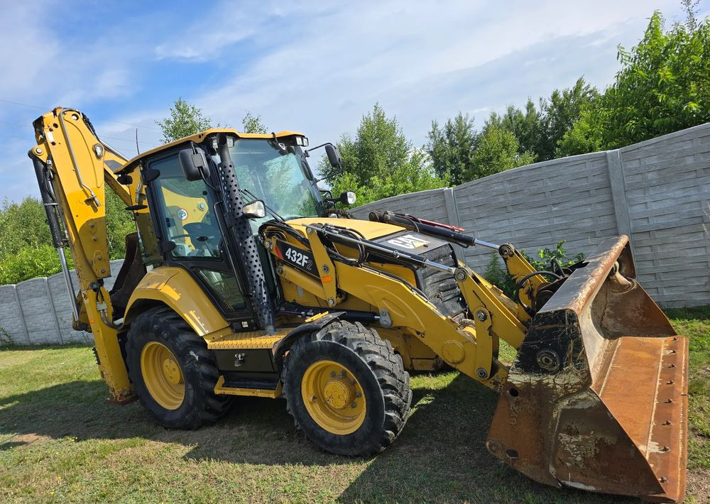 Caterpillar - Φορτωτής εκσκαφέας: φωτογραφία 2 Caterpillar - Φορτωτής εκσκαφέας: φωτογραφία 2