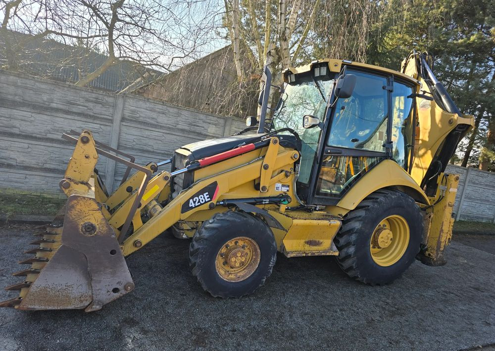 Caterpillar - Φορτωτής εκσκαφέας: φωτογραφία 5 Caterpillar - Φορτωτής εκσκαφέας: φωτογραφία 5