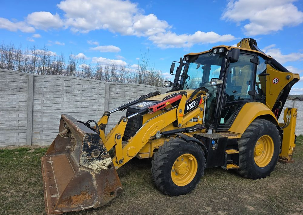 Caterpillar - Φορτωτής εκσκαφέας: φωτογραφία 1 Caterpillar - Φορτωτής εκσκαφέας: φωτογραφία 1