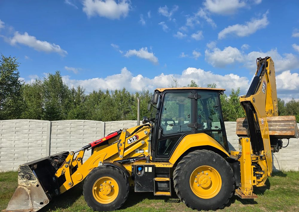 Caterpillar - Φορτωτής εκσκαφέας: φωτογραφία 5 Caterpillar - Φορτωτής εκσκαφέας: φωτογραφία 5