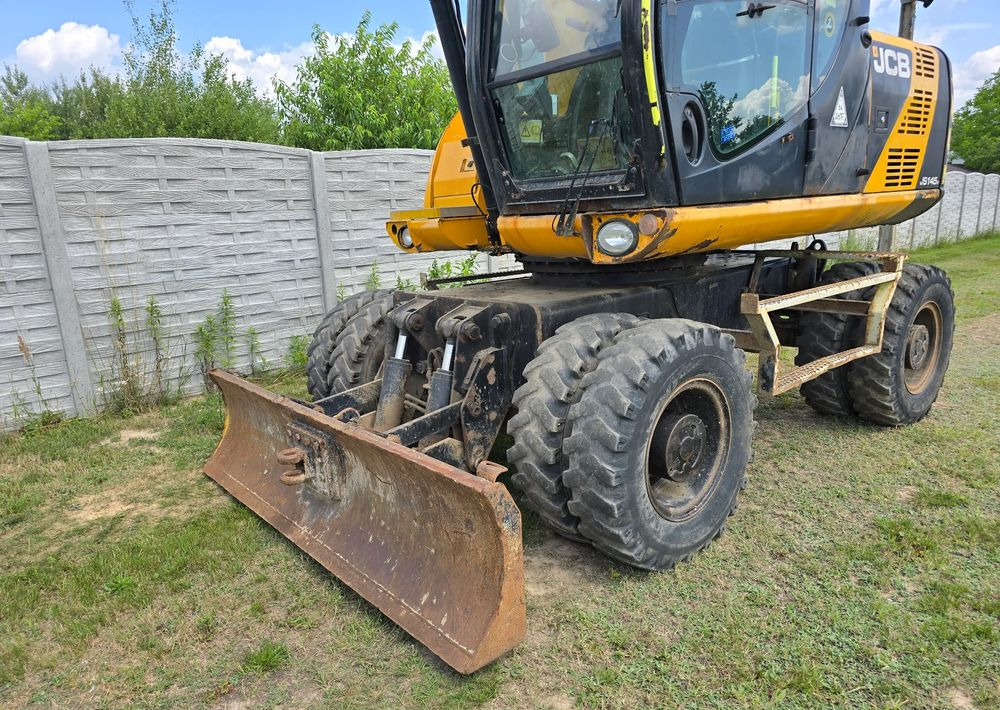 JCB - Τροχοφόρος εκσκαφέας: φωτογραφία 5 JCB - Τροχοφόρος εκσκαφέας: φωτογραφία 5