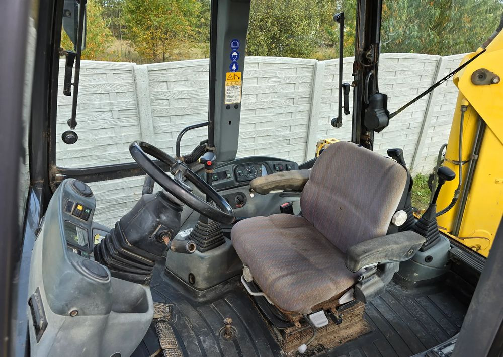 New Holland - Φορτωτής εκσκαφέας: φωτογραφία 3 New Holland - Φορτωτής εκσκαφέας: φωτογραφία 3