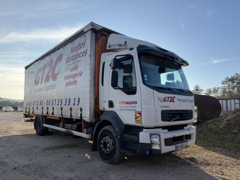 Volvo FL - Φορτηγό μουσαμάς: φωτογραφία 1 Volvo FL - Φορτηγό μουσαμάς: φωτογραφία 1