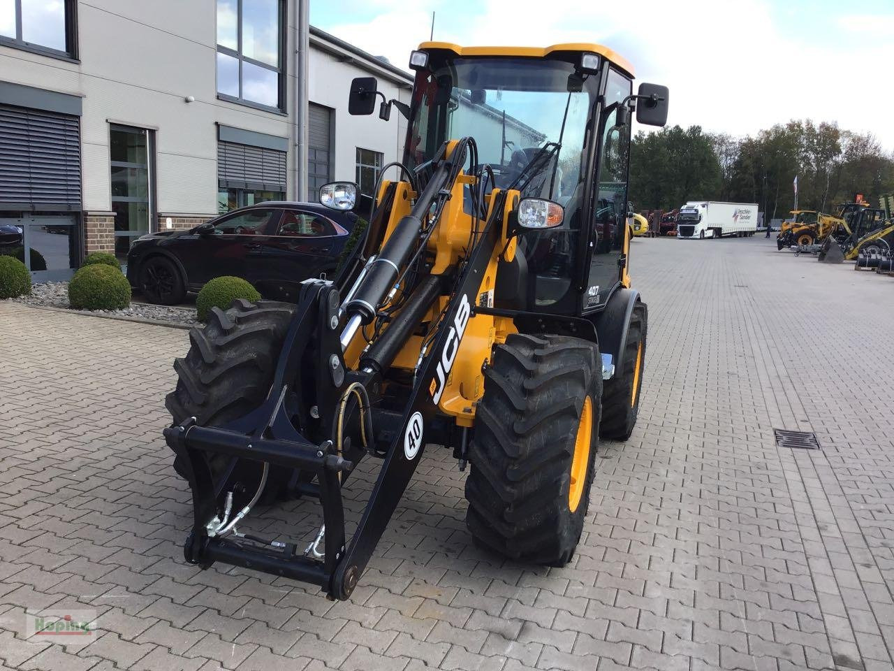 JCB 407 (35 km/h) - Ελαστιχοφόρος φορτωτής: φωτογραφία 2 JCB 407 (35 km/h) - Ελαστιχοφόρος φορτωτής: φωτογραφία 2