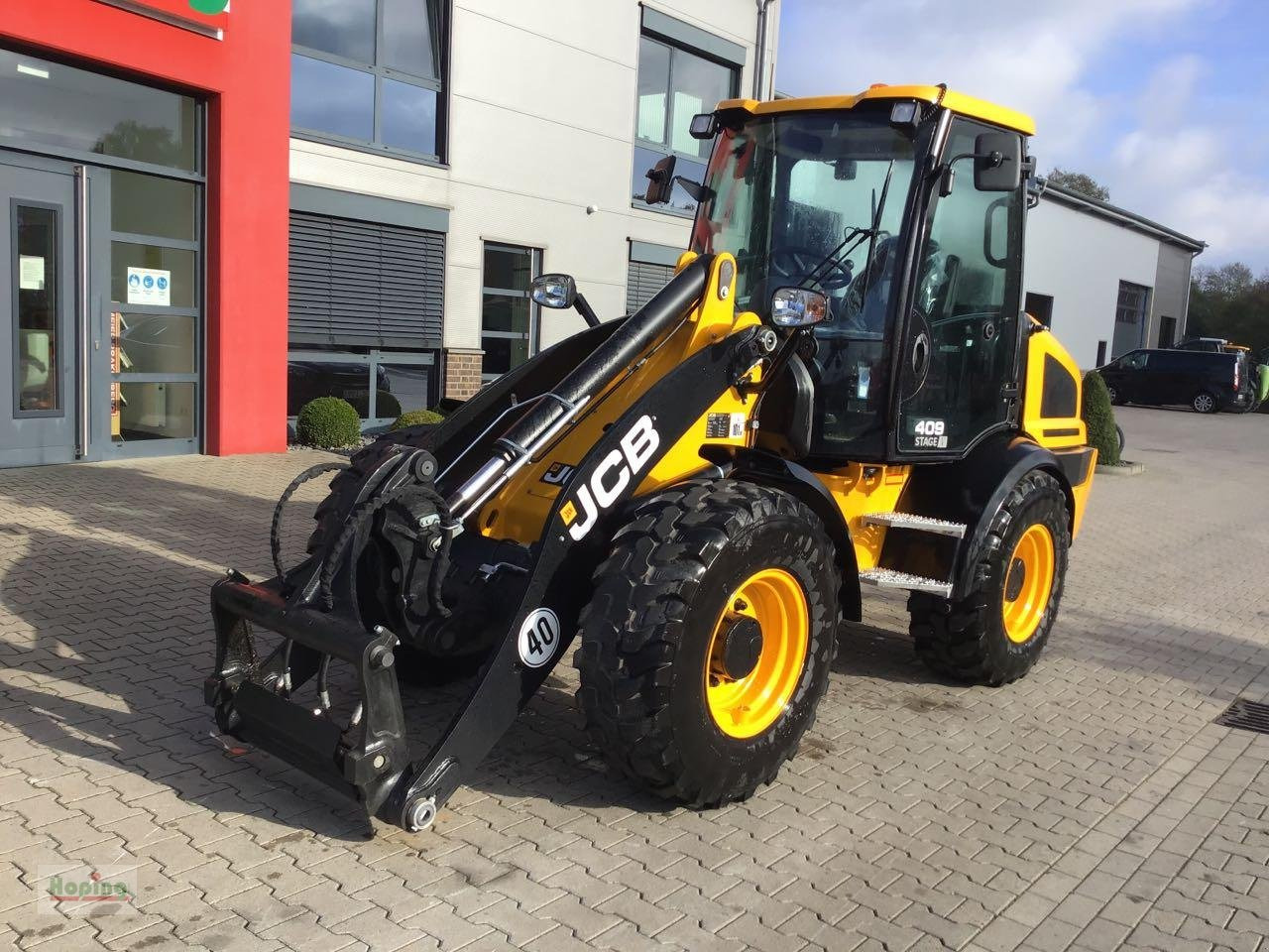 JCB 409 (40 km/h) - Ελαστιχοφόρος φορτωτής: φωτογραφία 2 JCB 409 (40 km/h) - Ελαστιχοφόρος φορτωτής: φωτογραφία 2