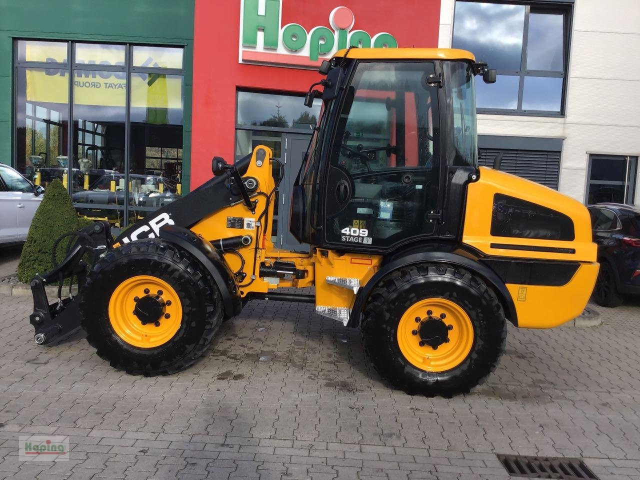 JCB 409 (40 km/h) - Ελαστιχοφόρος φορτωτής: φωτογραφία 1 JCB 409 (40 km/h) - Ελαστιχοφόρος φορτωτής: φωτογραφία 1
