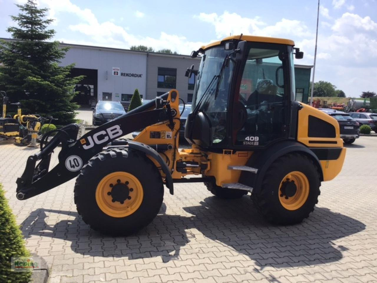 JCB 409 (40 km/h) - Ελαστιχοφόρος φορτωτής: φωτογραφία 4 JCB 409 (40 km/h) - Ελαστιχοφόρος φορτωτής: φωτογραφία 4