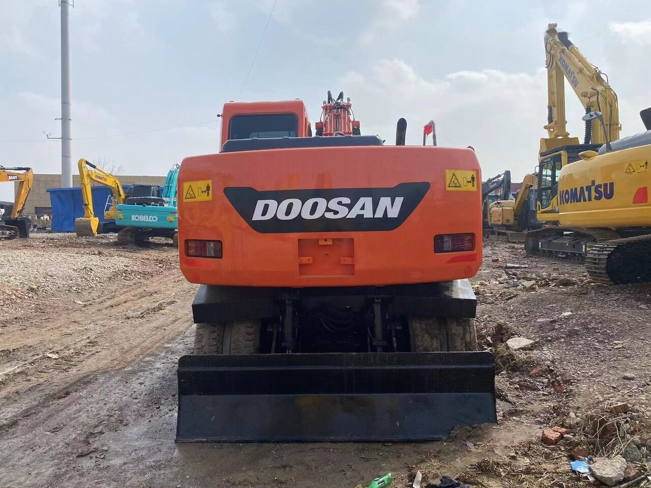 Doosan DX150W - Τροχοφόρος εκσκαφέας: φωτογραφία 1 Doosan DX150W - Τροχοφόρος εκσκαφέας: φωτογραφία 1