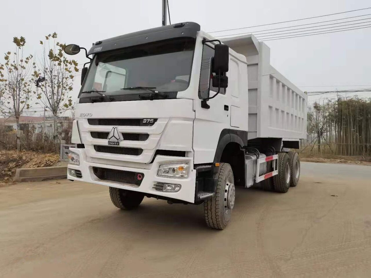 Howo 375 - Φορτηγό ανατρεπόμενο: φωτογραφία 1 Howo 375 - Φορτηγό ανατρεπόμενο: φωτογραφία 1