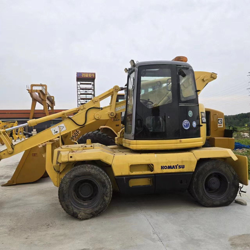 KOMATSU PC128US - Τροχοφόρος εκσκαφέας: φωτογραφία 2 KOMATSU PC128US - Τροχοφόρος εκσκαφέας: φωτογραφία 2