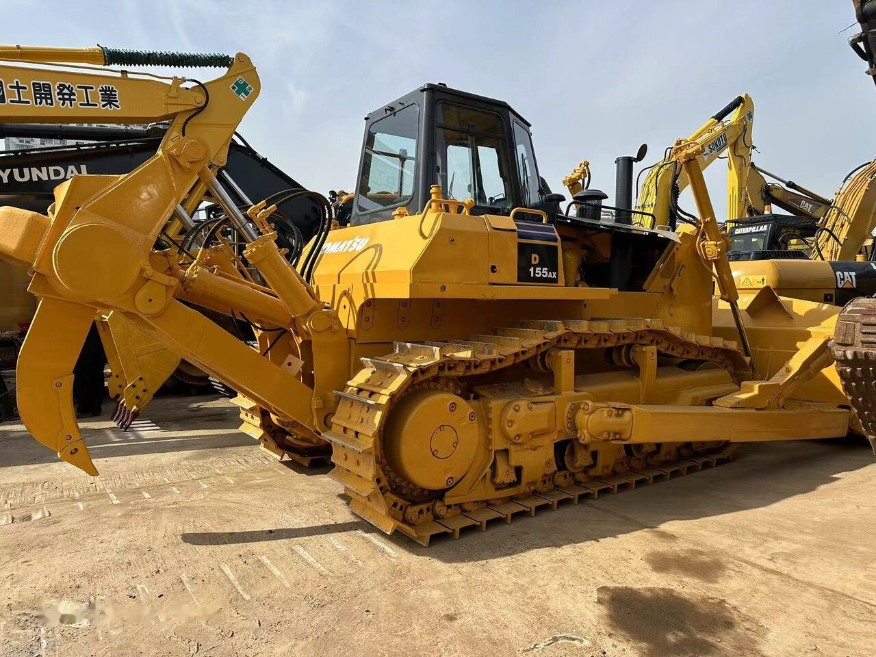 Komatsu D155A-5 - Μπουλντόζα: φωτογραφία 1 Komatsu D155A-5 - Μπουλντόζα: φωτογραφία 1