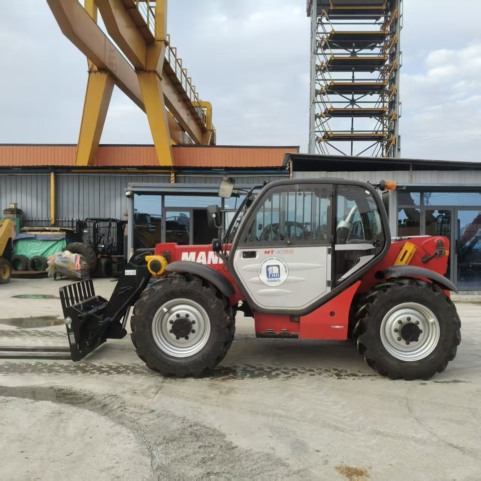 MANITOU MT-X732 - Τηλεσκοπικός φορτωτής: φωτογραφία 1 MANITOU MT-X732 - Τηλεσκοπικός φορτωτής: φωτογραφία 1