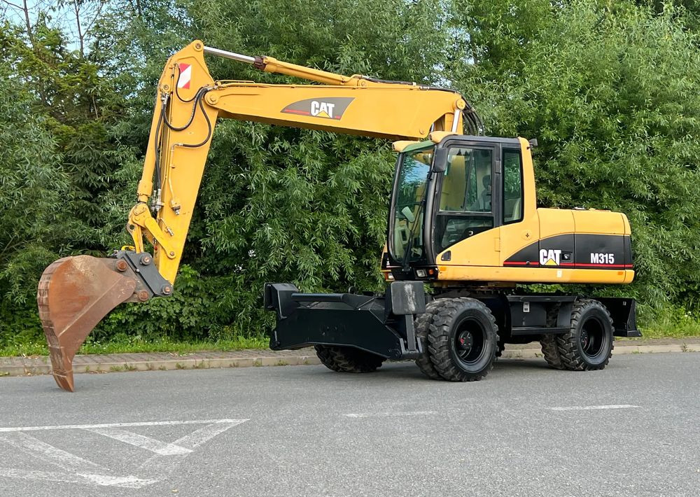 Caterpillar CAT M315C CATERPILLAR SPROWADZONY Bardzo Dobry Stan - Τροχοφόρος εκσκαφέας: φωτογραφία 2 Caterpillar CAT M315C CATERPILLAR SPROWADZONY Bardzo Dobry Stan - Τροχοφόρος εκσκαφέας: φωτογραφία 2