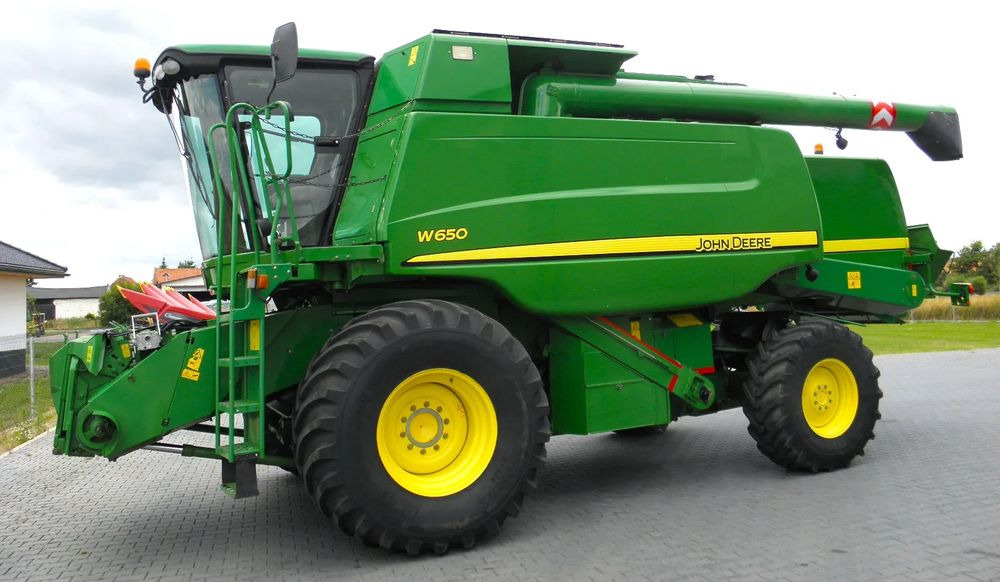 John Deere W650 2008 Rok, heder 6,7m, Nie Malowany, Stan Bardzo Dobry - Θεριζοαλωνιστική μηχανή: φωτογραφία 1 John Deere W650 2008 Rok, heder 6,7m, Nie Malowany, Stan Bardzo Dobry - Θεριζοαλωνιστική μηχανή: φωτογραφία 1
