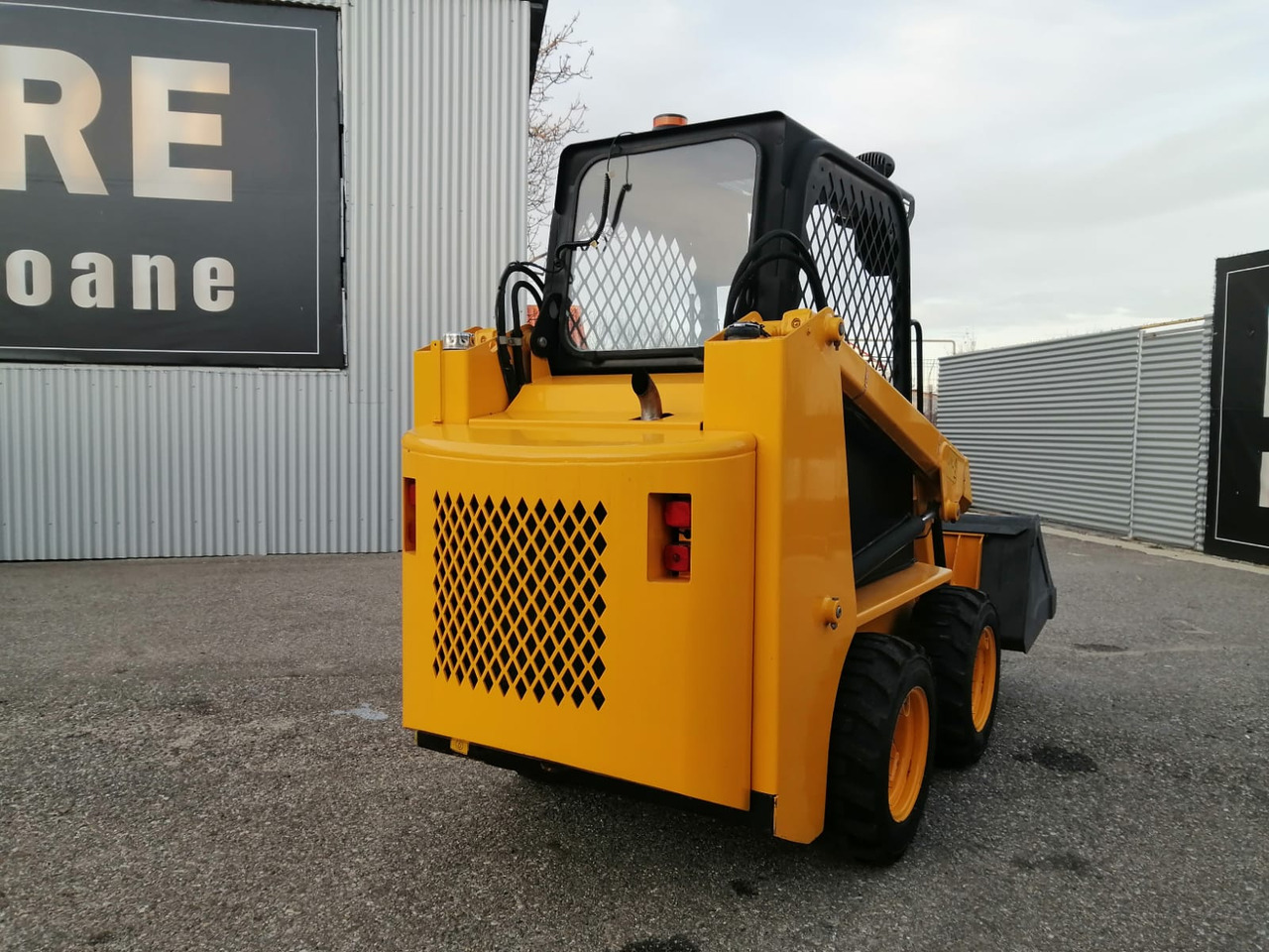 Bobcat Front Loader Ram Italia FM 120 – Hammer Installation - Φορτωτής πλάγιας ολίσθησης: φωτογραφία 3 Bobcat Front Loader Ram Italia FM 120 – Hammer Installation - Φορτωτής πλάγιας ολίσθησης: φωτογραφία 3