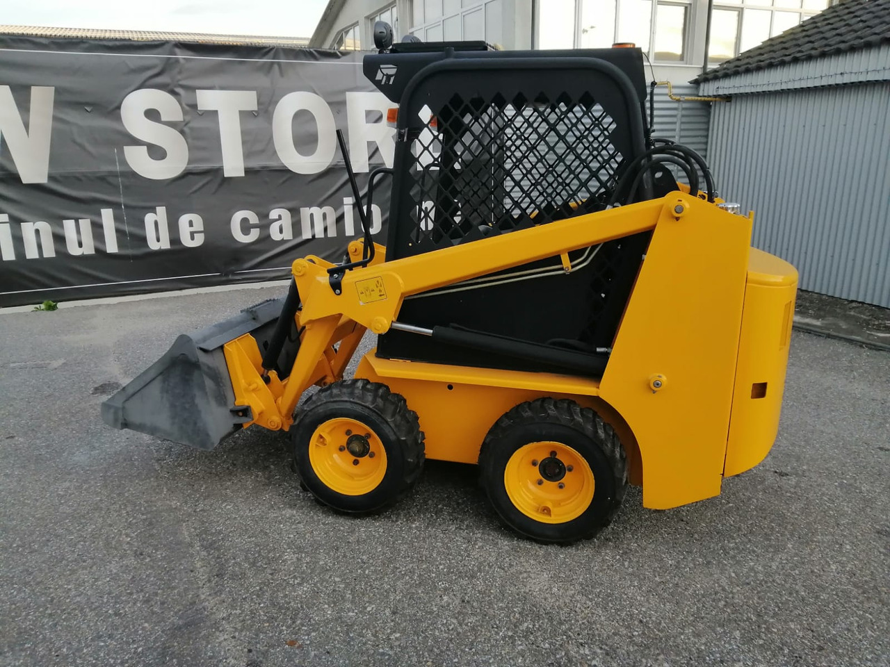 Bobcat Front Loader Ram Italia FM 120 – Hammer Installation - Φορτωτής πλάγιας ολίσθησης: φωτογραφία 4 Bobcat Front Loader Ram Italia FM 120 – Hammer Installation - Φορτωτής πλάγιας ολίσθησης: φωτογραφία 4
