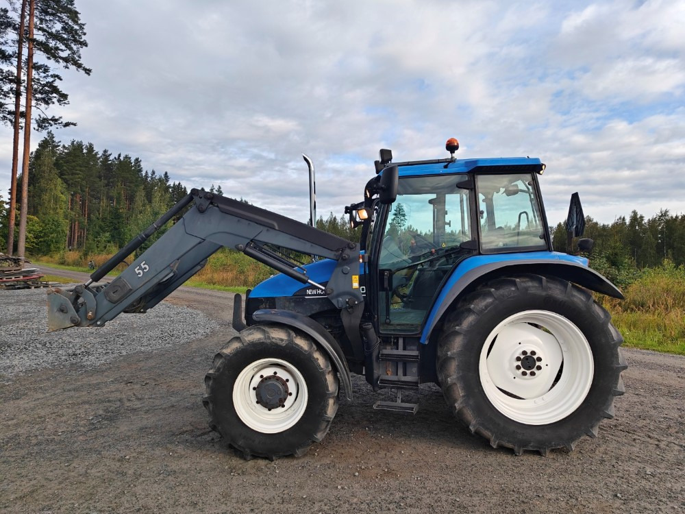 New Holland TS100, ES vaihteisto, ilmastointi, etukuormaaja Ålö Q55, katso video! - Τρακτέρ: φωτογραφία 2 New Holland TS100, ES vaihteisto, ilmastointi, etukuormaaja Ålö Q55, katso video! - Τρακτέρ: φωτογραφία 2