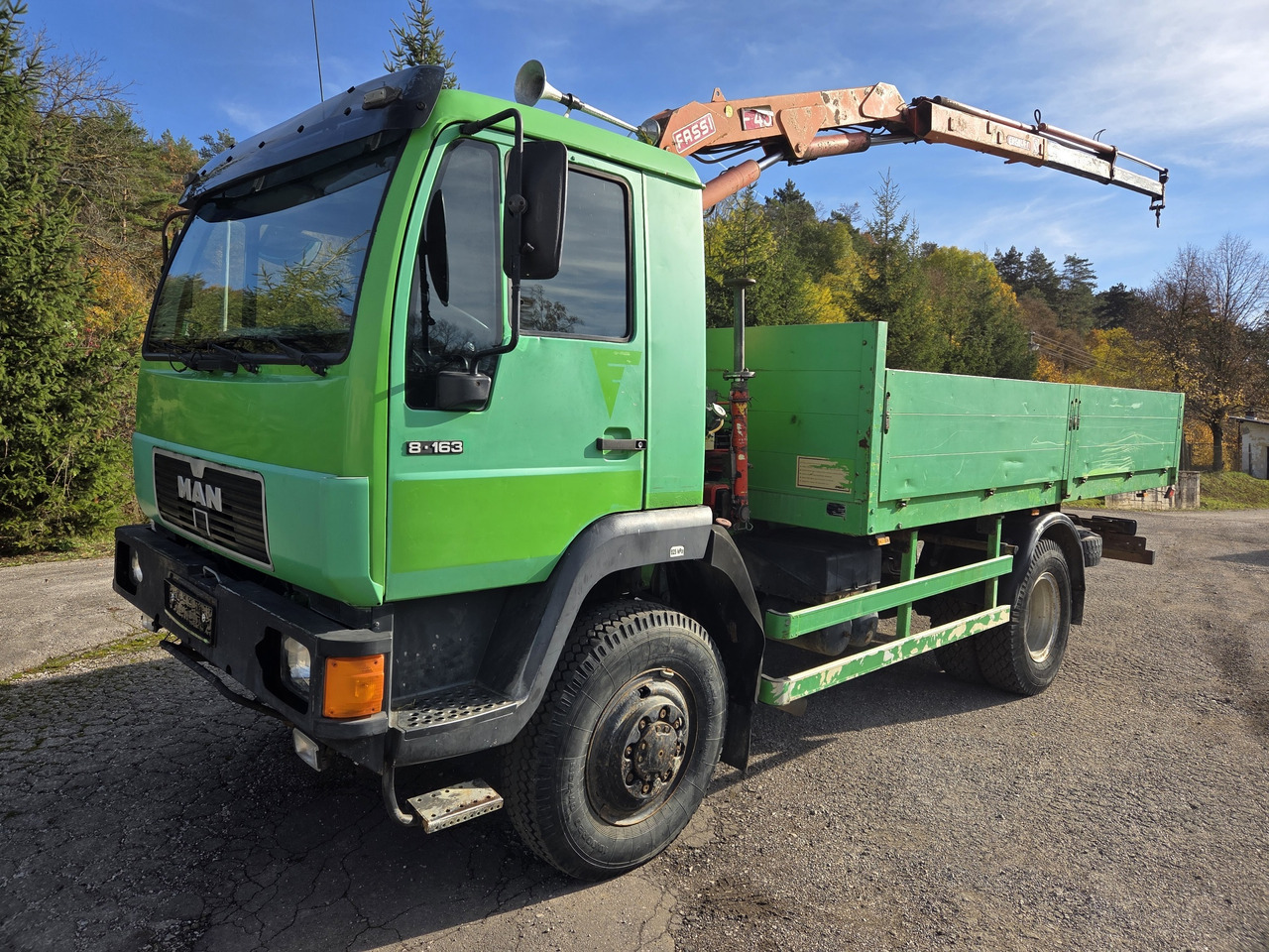MAN 8.163 4x4 + crane FASSI F45A.22 - Φορτηγό με ανοιχτή καρότσα: φωτογραφία 1 MAN 8.163 4x4 + crane FASSI F45A.22 - Φορτηγό με ανοιχτή καρότσα: φωτογραφία 1