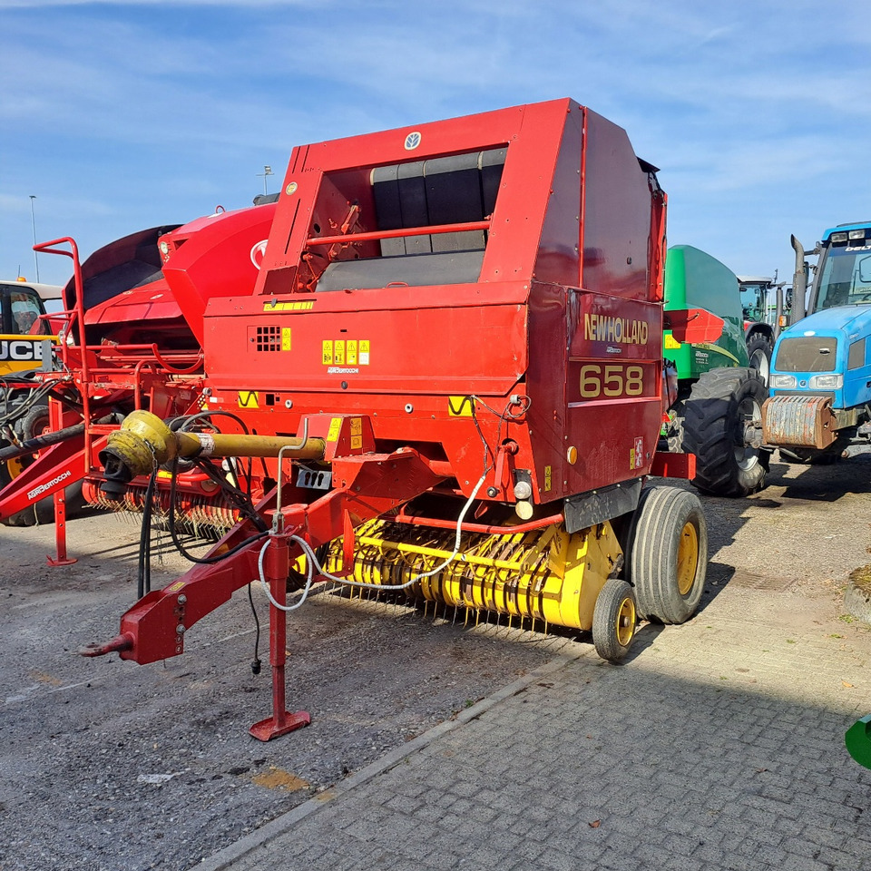 ROTOPRESSA NEW HOLLAND 658 - Χορτοδετική μηχανή στρόγγυλης μπάλας: φωτογραφία 1 ROTOPRESSA NEW HOLLAND 658 - Χορτοδετική μηχανή στρόγγυλης μπάλας: φωτογραφία 1