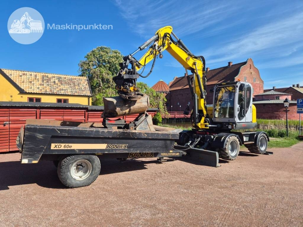 Wacker Neuson EW 100 med vagn - Τροχοφόρος εκσκαφέας: φωτογραφία 1 Wacker Neuson EW 100 med vagn - Τροχοφόρος εκσκαφέας: φωτογραφία 1
