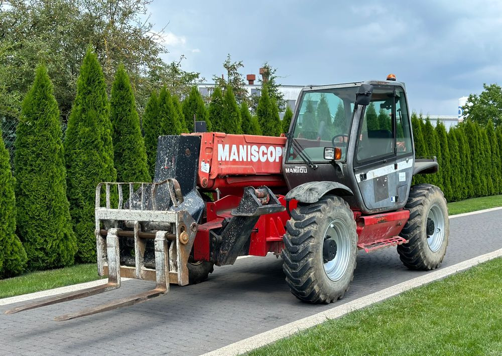 Manitou MT 1233S 12 M - Τηλεσκοπικός φορτωτής: φωτογραφία 1 Manitou MT 1233S 12 M - Τηλεσκοπικός φορτωτής: φωτογραφία 1