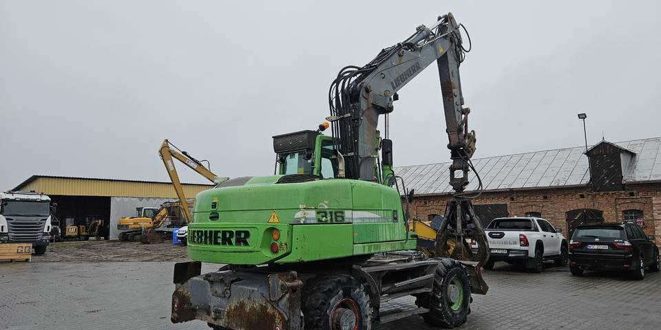 Koparka kołowa Liebherr A 316 Litronic chwytak podpory pług - Τροχοφόρος εκσκαφέας: φωτογραφία 5 Koparka kołowa Liebherr A 316 Litronic chwytak podpory pług - Τροχοφόρος εκσκαφέας: φωτογραφία 5