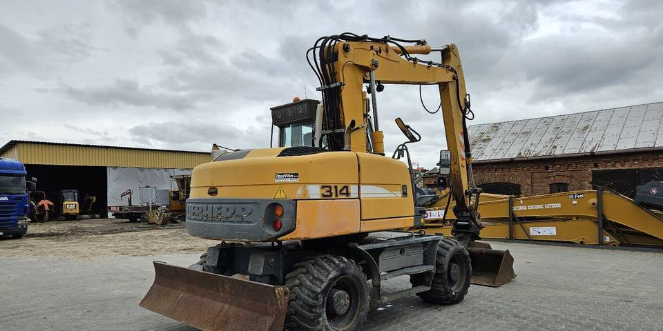 Τροχοφόρος εκσκαφέας Koparka kołowa Liebherr A314 Litronic 9350 h+ 5 łyżek kołówka: φωτογραφία 6 Τροχοφόρος εκσκαφέας Koparka kołowa Liebherr A314 Litronic 9350 h+ 5 łyżek kołówka: φωτογραφία 6