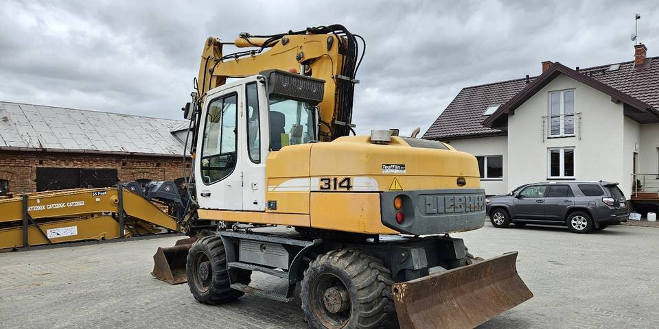 Τροχοφόρος εκσκαφέας Koparka kołowa Liebherr A314 Litronic 9350 h+ 5 łyżek kołówka: φωτογραφία 8 Τροχοφόρος εκσκαφέας Koparka kołowa Liebherr A314 Litronic 9350 h+ 5 łyżek kołówka: φωτογραφία 8