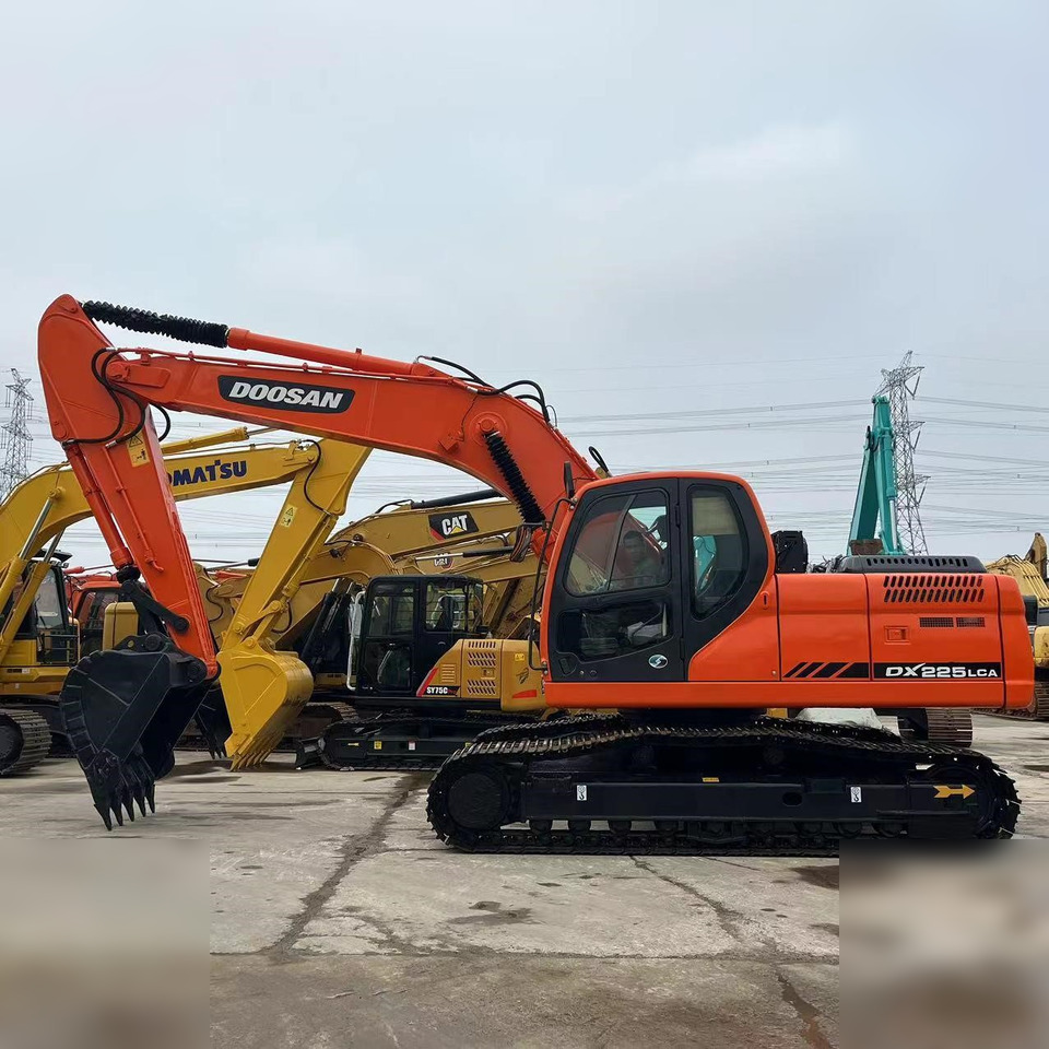 DOOSAN DX225 LCA - Ερπυστριοφόρος εκσκαφέας: φωτογραφία 1 DOOSAN DX225 LCA - Ερπυστριοφόρος εκσκαφέας: φωτογραφία 1