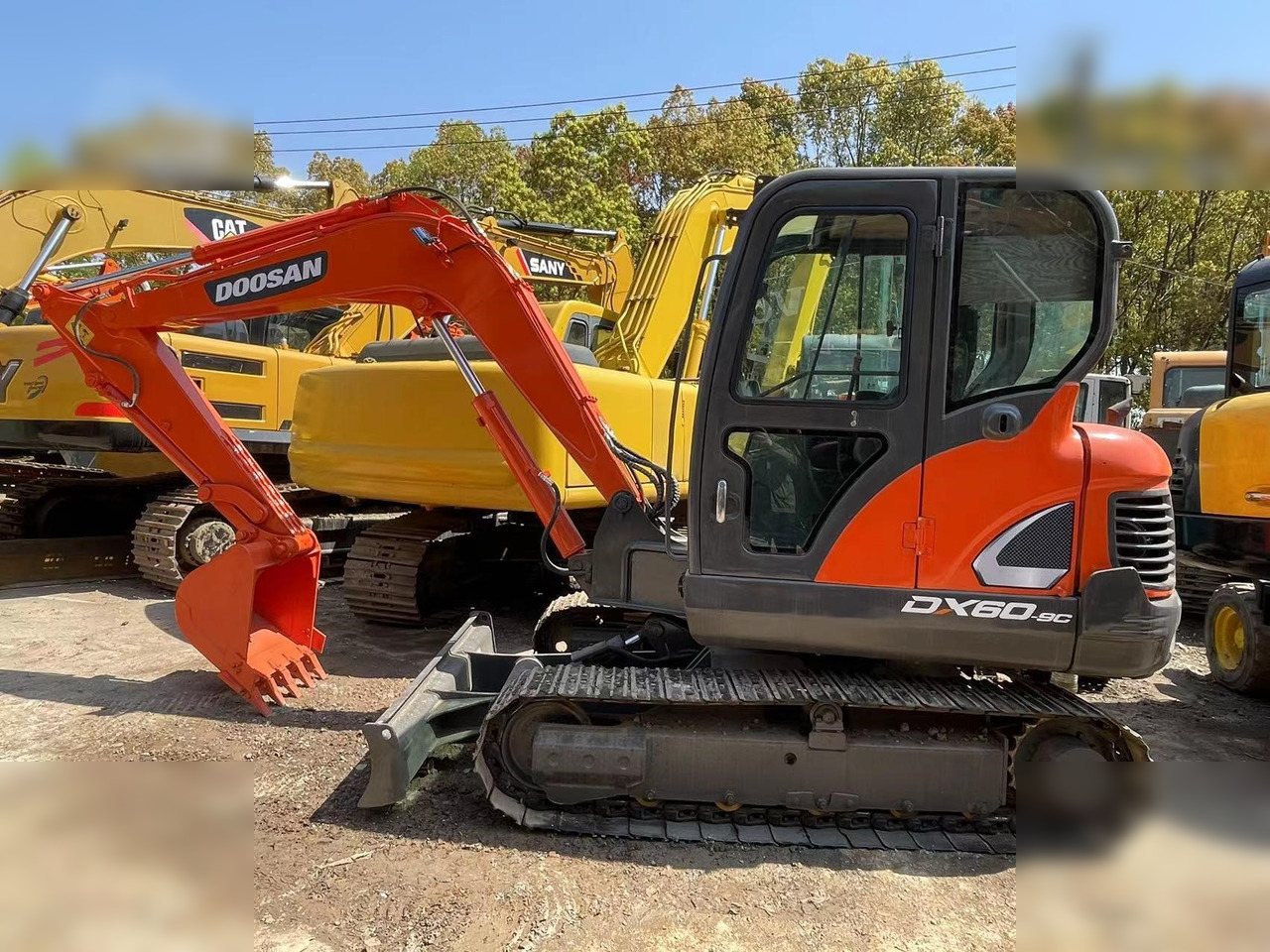 DOOSAN DX60-9C - Ερπυστριοφόρος εκσκαφέας: φωτογραφία 1 DOOSAN DX60-9C - Ερπυστριοφόρος εκσκαφέας: φωτογραφία 1