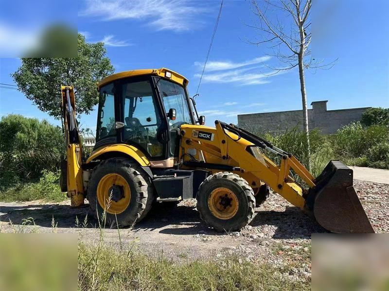 JCB 3CX - Φορτωτής εκσκαφέας: φωτογραφία 1 JCB 3CX - Φορτωτής εκσκαφέας: φωτογραφία 1