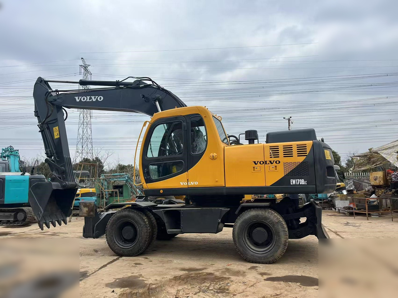 VOLVO EW170 - Τροχοφόρος εκσκαφέας: φωτογραφία 1 VOLVO EW170 - Τροχοφόρος εκσκαφέας: φωτογραφία 1