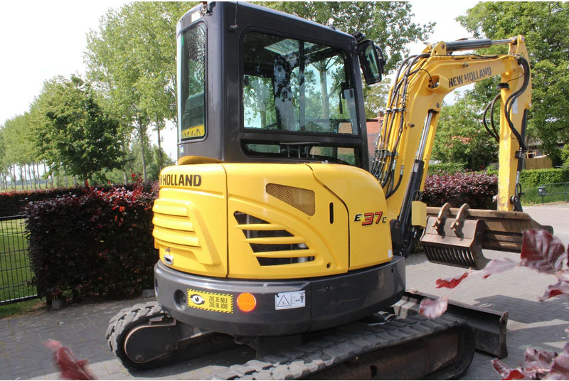 New Holland E37C binnendraaier - Μικρός αυτοκινούμενος γερανός: φωτογραφία 4 New Holland E37C binnendraaier - Μικρός αυτοκινούμενος γερανός: φωτογραφία 4