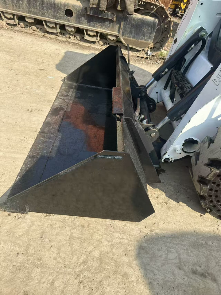 Ελαστιχοφόρος φορτωτής BOBCAT s550: φωτογραφία 9