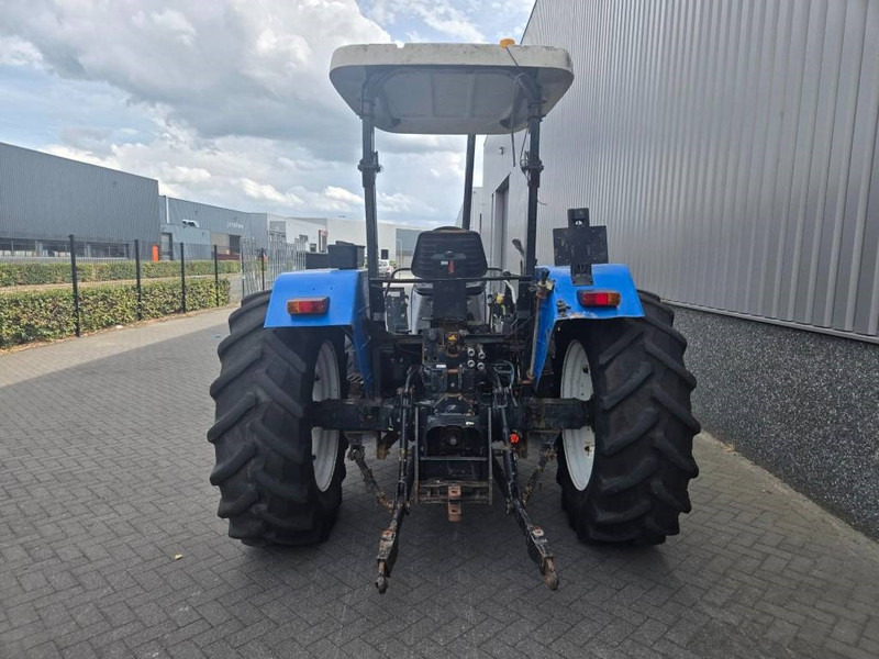New Holland TL 90 A - Τρακτέρ: φωτογραφία 4 New Holland TL 90 A - Τρακτέρ: φωτογραφία 4