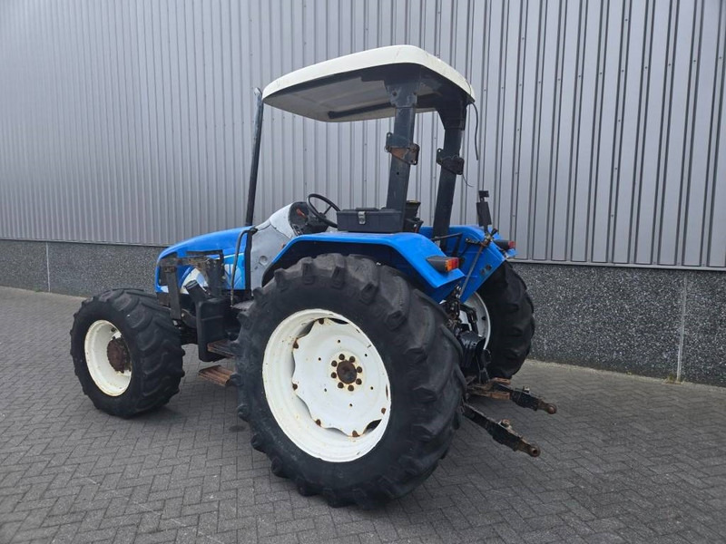 New Holland TL 90 A - Τρακτέρ: φωτογραφία 3 New Holland TL 90 A - Τρακτέρ: φωτογραφία 3