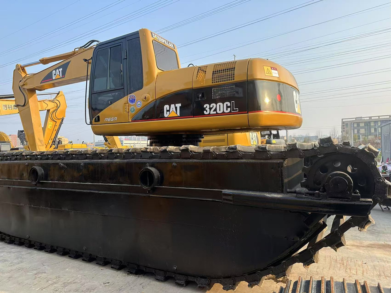 CATERPILLAR 320C Amphibious excavator - Πλωτός εκσκαφέας: φωτογραφία 1 CATERPILLAR 320C Amphibious excavator - Πλωτός εκσκαφέας: φωτογραφία 1