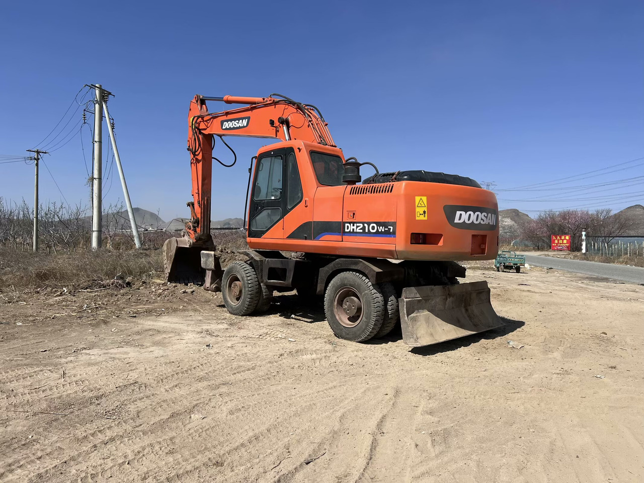 DOOSAN DH210W-7 - Τροχοφόρος εκσκαφέας: φωτογραφία 3 DOOSAN DH210W-7 - Τροχοφόρος εκσκαφέας: φωτογραφία 3