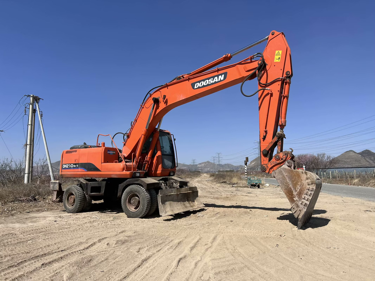 DOOSAN DH210W-7 - Τροχοφόρος εκσκαφέας: φωτογραφία 2 DOOSAN DH210W-7 - Τροχοφόρος εκσκαφέας: φωτογραφία 2