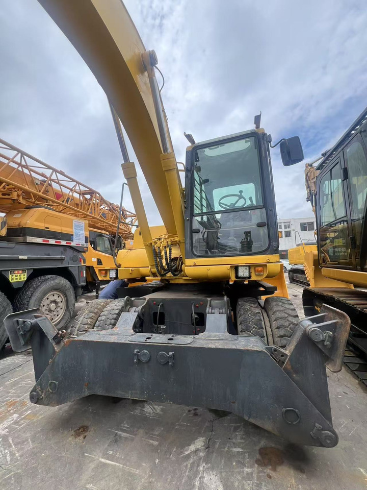 KOMATSU PW150 - Τροχοφόρος εκσκαφέας: φωτογραφία 1 KOMATSU PW150 - Τροχοφόρος εκσκαφέας: φωτογραφία 1