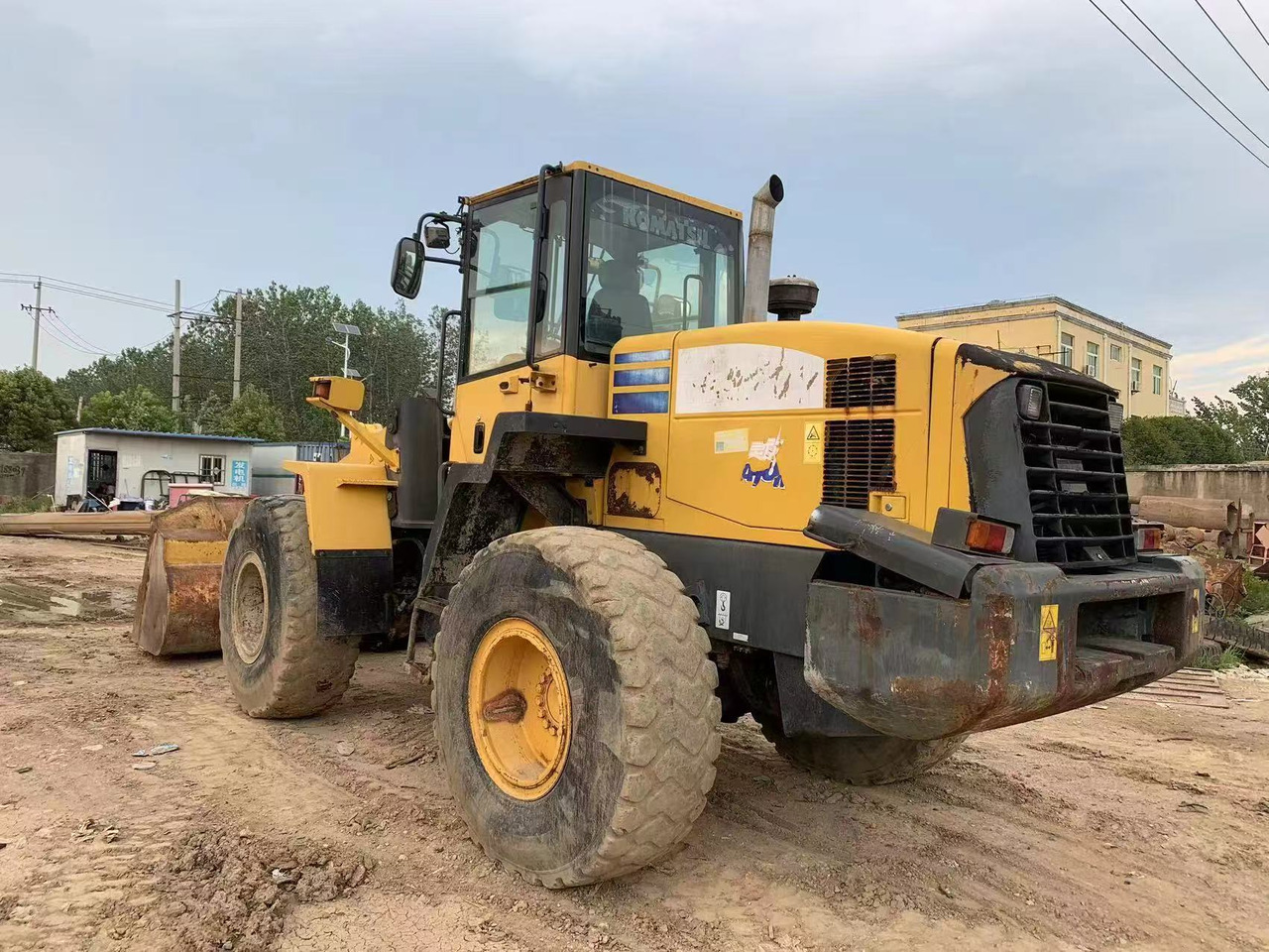 KOMATSU WA320-5 - Ελαστιχοφόρος φορτωτής: φωτογραφία 1 KOMATSU WA320-5 - Ελαστιχοφόρος φορτωτής: φωτογραφία 1