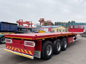 TITAN Flatbed Tri Axle Truck Trailer for Sale in Tanzania - Επικαθήμενο πλατφόρμα/ Καρότσα: φωτογραφία 2 TITAN Flatbed Tri Axle Truck Trailer for Sale in Tanzania - Επικαθήμενο πλατφόρμα/ Καρότσα: φωτογραφία 2