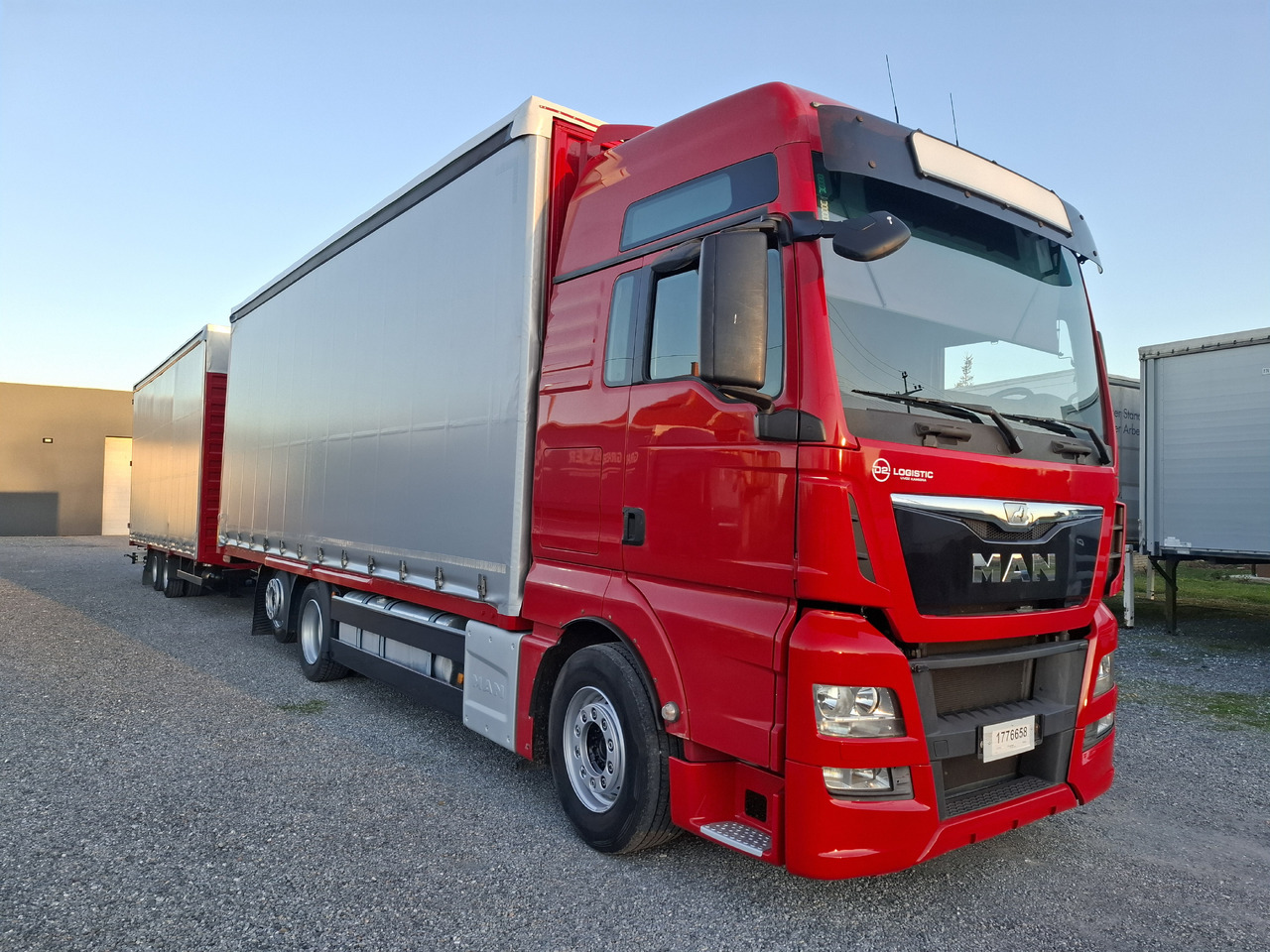 MAN TGX 26.440 E6 + SCHMITZ - Φορτηγό μουσαμάς: φωτογραφία 4 MAN TGX 26.440 E6 + SCHMITZ - Φορτηγό μουσαμάς: φωτογραφία 4