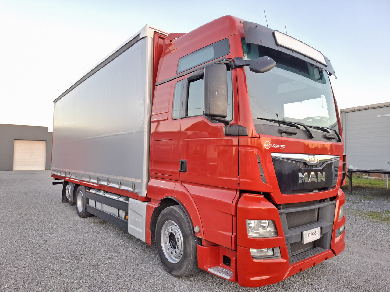 MAN TGX 26.440 E6 - Φορτηγό μουσαμάς: φωτογραφία 1 MAN TGX 26.440 E6 - Φορτηγό μουσαμάς: φωτογραφία 1