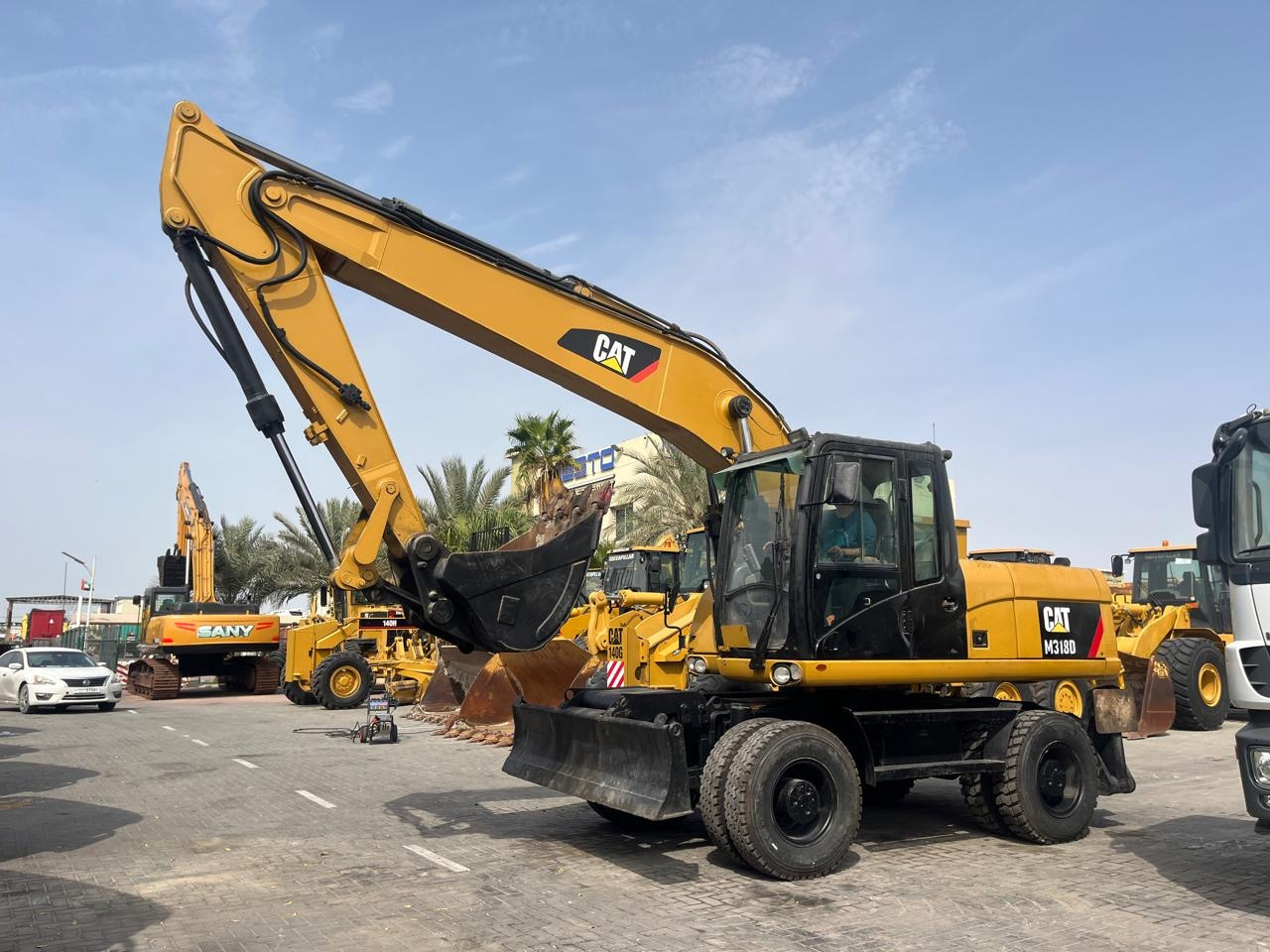 CATERPILLAR M318D - Τροχοφόρος εκσκαφέας: φωτογραφία 1 CATERPILLAR M318D - Τροχοφόρος εκσκαφέας: φωτογραφία 1